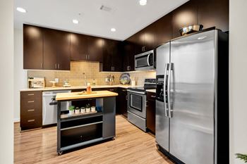 Allure Hermann Park | Kitchen with Stainless Steel Appliances